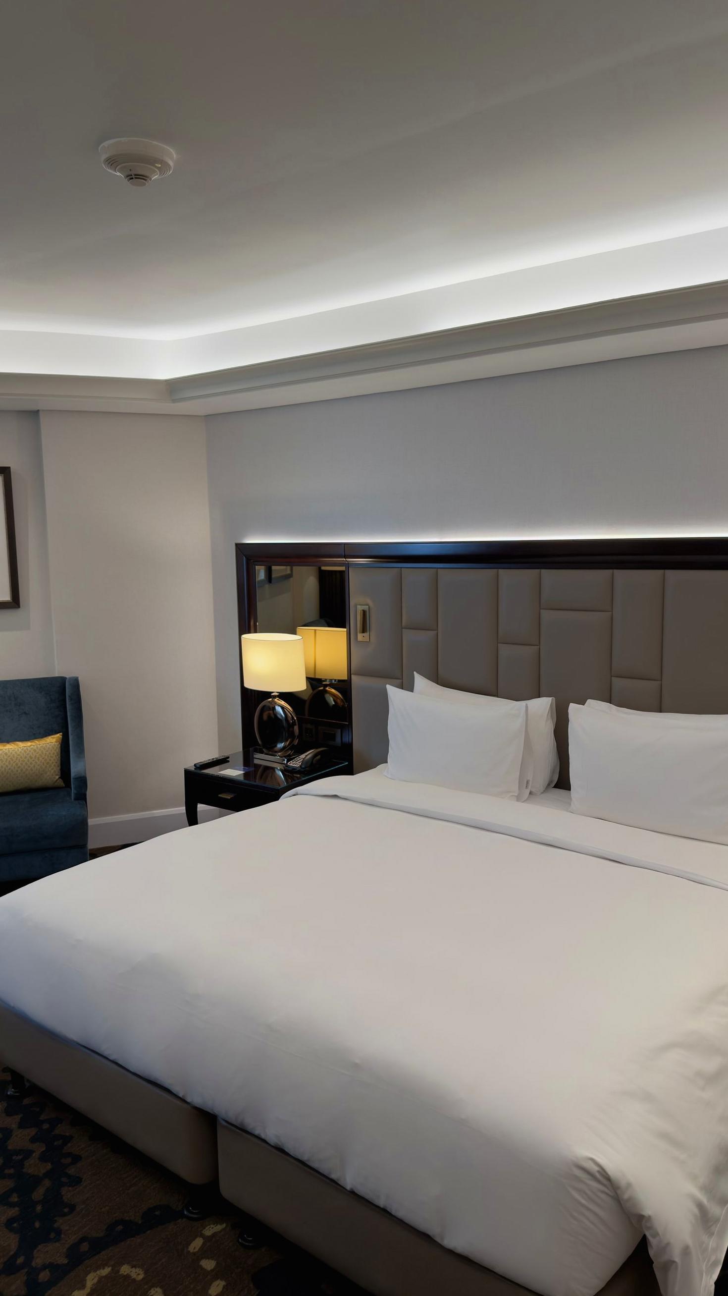 Luxurious king-size bed in a modern room
