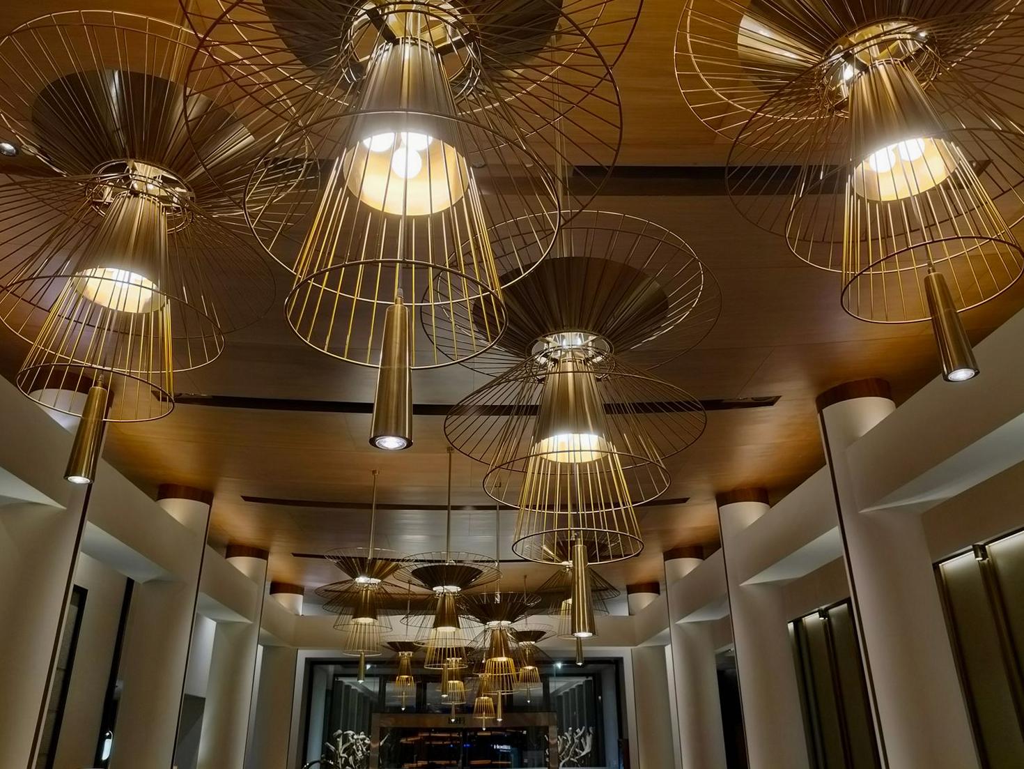 Warmly lit stylish hotel lobby at Joyrushtoday Hotel